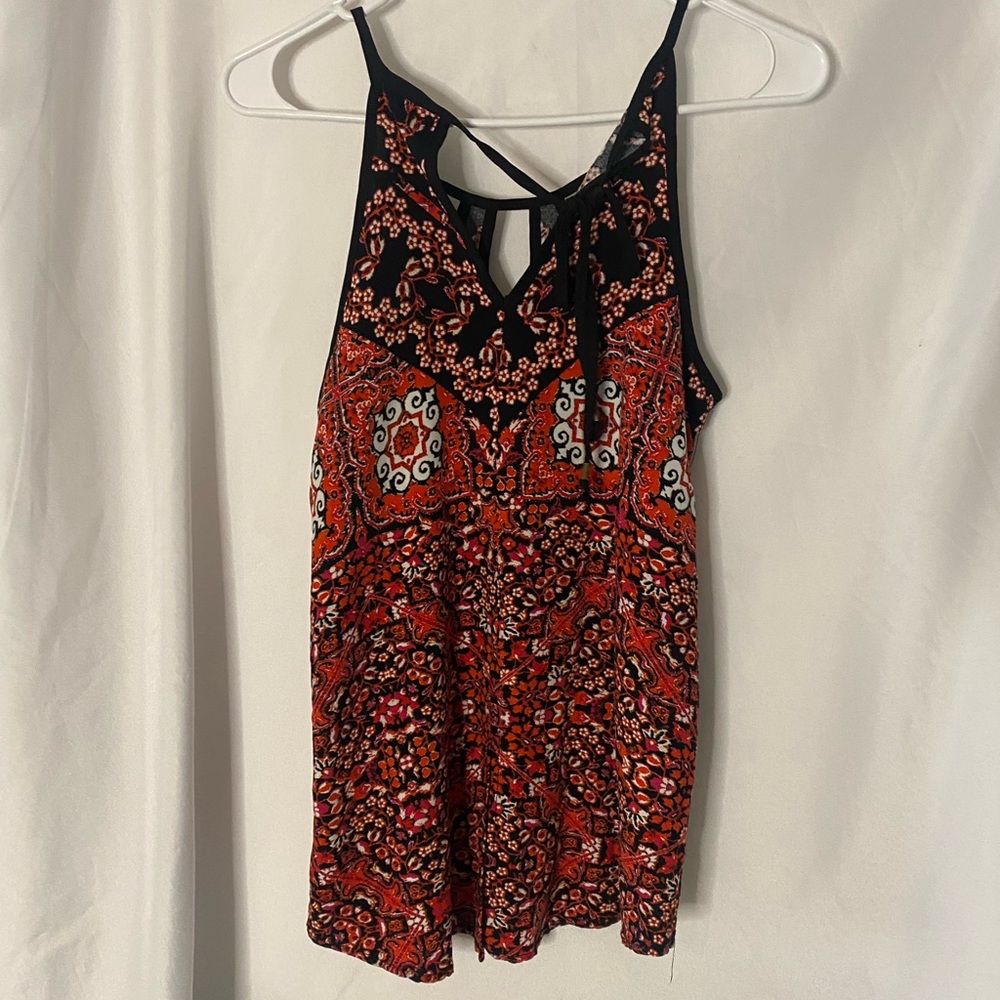 Red and black flowy blouse